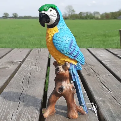 Beeldje papegaai geel-blauw 20cm hoog