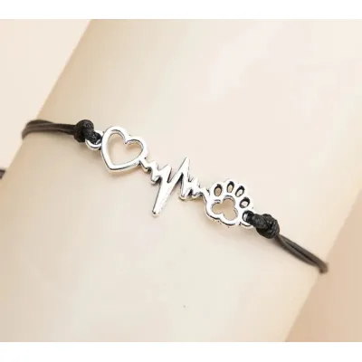 Zilverkleurige heartbeat armband hondenpoot